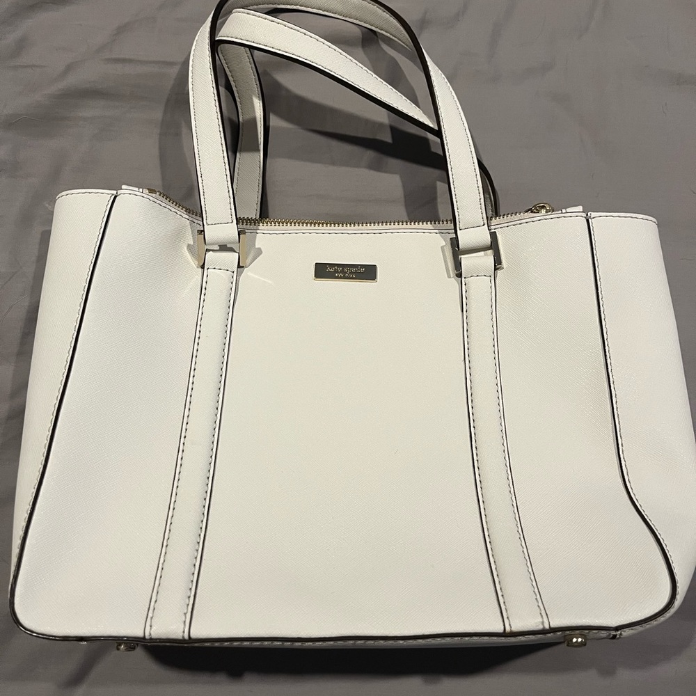Off-white Kate Spade squared purse.